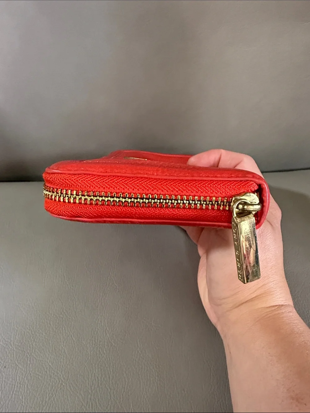 Tory Burch orange Pebbled Leather Zip Wallet with Gold Logo